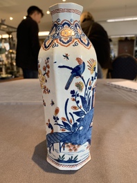 A pair of polychrome Dutch Delft octagonal chinoiserie vases, 18th C.