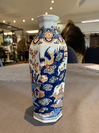 A pair of polychrome Dutch Delft octagonal chinoiserie vases, 18th C.