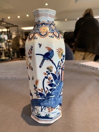 A pair of polychrome Dutch Delft octagonal chinoiserie vases, 18th C.
