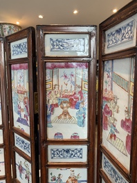 A Chinese four-part folding screen with famille rose plaques, 19th C.
