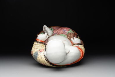 A large Chinese famille rose Milefo Buddha on wooden stand, 20th C.