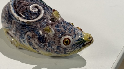 A polychrome Dutch Delft model of a squirrel, 18th C.