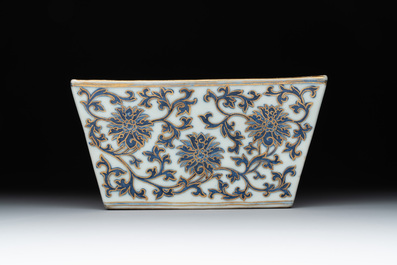 A Chinese gilt-decorated blue and white 'lotus scroll' square bowl, a saucer and a doucai 'dragon' cup, Daoguang mark and of the period