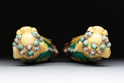 A pair of Chinese sancai-glazed rooftiles, a pair of Buddhist lions and a warrior, Ming and later