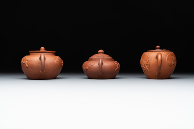 Three Chinese Yixing stoneware teapots and covers, 18th C.