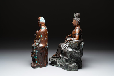 A large Chinese bronze Guanyin seated on rocks and a group of Guanyin with child, 20th C.