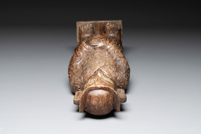 A Chinese Sanxingdui-style marble sculpture of a warrior, 20th C.