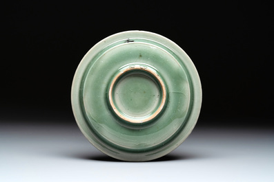 A Chinese Longquan celadon 'twin fish' plate, Yuan/Ming