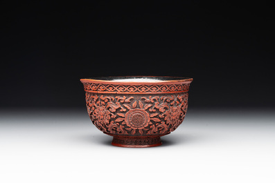 A Chinese cinnabar lacquer quadrifoil covered box and a 'lotus and shou' bowl, 19th C.