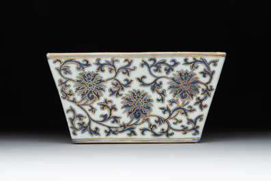 A Chinese gilt-decorated blue and white 'lotus scroll' square bowl, a saucer and a doucai 'dragon' cup, Daoguang mark and of the period