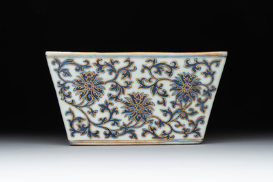 A Chinese gilt-decorated blue and white 'lotus scroll' square bowl, a saucer and a doucai 'dragon' cup, Daoguang mark and of the period
