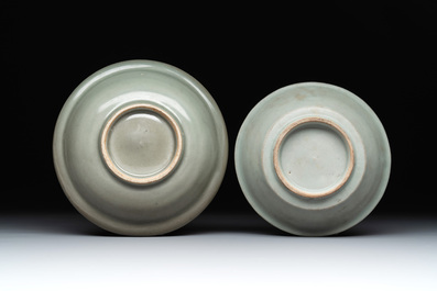 A Chinese Longquan celadon plate and two saucer dishes, Ming