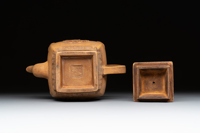 Two Chinese Yixing stoneware teapots, seal marks, 19th C.