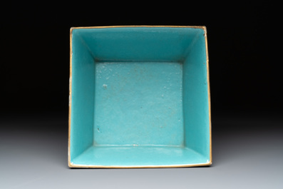 A Chinese gilt-decorated blue and white 'lotus scroll' square bowl, a saucer and a doucai 'dragon' cup, Daoguang mark and of the period
