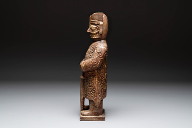 A Chinese Sanxingdui-style marble sculpture of a warrior, 20th C.
