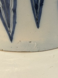 A very large Dutch Delft blue and white chinoiserie baluster vase, last quarter 17th C.