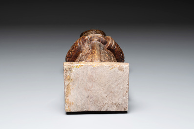 A Chinese Sanxingdui-style marble sculpture of a warrior, 20th C.