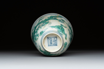 A Chinese gilt-decorated blue and white 'lotus scroll' square bowl, a saucer and a doucai 'dragon' cup, Daoguang mark and of the period