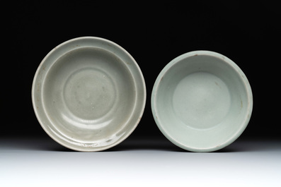 A Chinese Longquan celadon plate and two saucer dishes, Ming