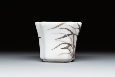 A Chinese grisaille 'orchid' cup, two snuff dishes, a famille rose seal paste box and a qianjiang cai plaque, 19/20th C.