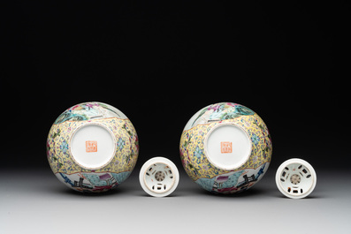 A pair of Chinese famille rose covered vases and a plate, Kangxi and Qianlong mark, 20th C.