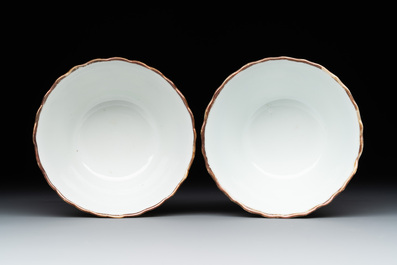 A pair of Chinese famille rose cups and saucers with figural design, Xianfeng mark and of the period
