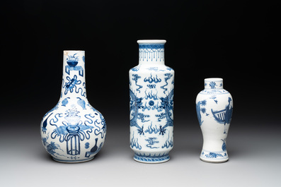 Three Chinese blue and white vases with antiquities, dragons and figures, 19th C.