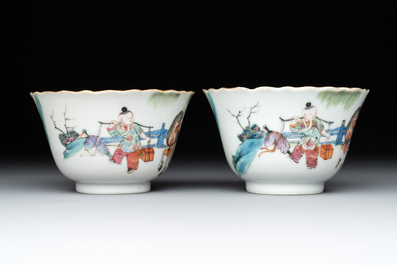 A pair of Chinese famille rose cups and saucers with figural design, Xianfeng mark and of the period