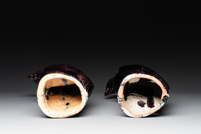 A pair of Chinese aubergine-glazed eagles, 19th C.