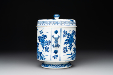 A Chinese blue and white two-handled container and cover with floral design, Kangxi
