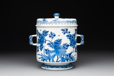 A Chinese blue and white two-handled container and cover with floral design, Kangxi