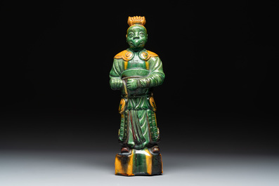 A Chinese sancai figure of Garuda, a cream-glazed vase and a pair of wucai jars, 19th C.