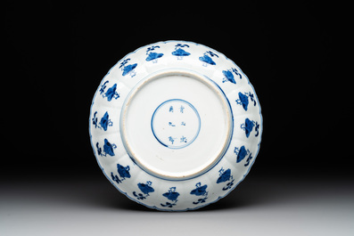 A Chinese blue and white 'Long Elizas' plate, Qi Yu Bao Ding Zhi Zhen 奇玉寶鼎之珍 mark, Kangxi