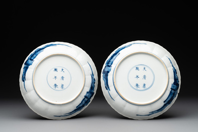 A pair of Chinese blue and white plates with floral design, Kangxi mark and of the period