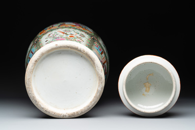 A pair of Chinese Canton famille rose vases and covers with narrative design, 19th C.