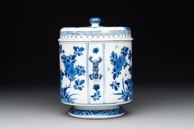 A Chinese blue and white two-handled container and cover with floral design, Kangxi
