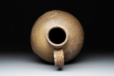 A Raeren stoneware jug, dated 1675