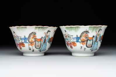 A pair of Chinese famille rose cups and saucers with figural design, Xianfeng mark and of the period