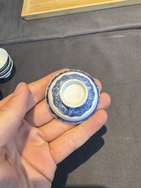 A collection of 32 pieces Chinese blue and white cups, saucers and covers with floral design, Qianlong