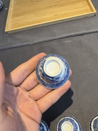 A collection of 32 pieces Chinese blue and white cups, saucers and covers with floral design, Qianlong