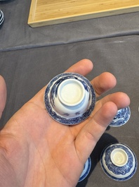 A collection of 32 pieces Chinese blue and white cups, saucers and covers with floral design, Qianlong