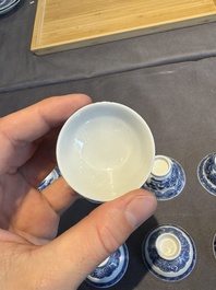 A collection of 32 pieces Chinese blue and white cups, saucers and covers with floral design, Qianlong