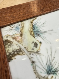 A Chinese hardwood low table with two famille rose plaques, Republic