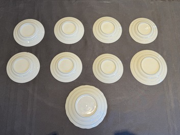 A collection of 32 pieces Chinese blue and white cups, saucers and covers with floral design, Qianlong