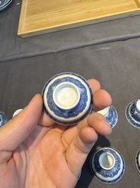 A collection of 32 pieces Chinese blue and white cups, saucers and covers with floral design, Qianlong