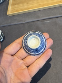 A collection of 32 pieces Chinese blue and white cups, saucers and covers with floral design, Qianlong