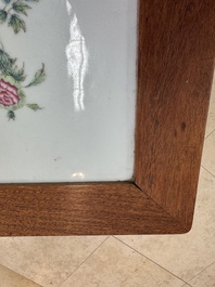 A Chinese hardwood low table with two famille rose plaques, Republic