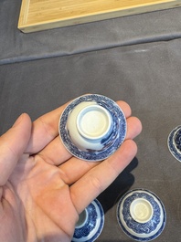 A collection of 32 pieces Chinese blue and white cups, saucers and covers with floral design, Qianlong