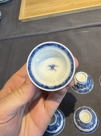 A collection of 32 pieces Chinese blue and white cups, saucers and covers with floral design, Qianlong