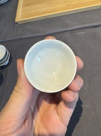 A collection of 32 pieces Chinese blue and white cups, saucers and covers with floral design, Qianlong